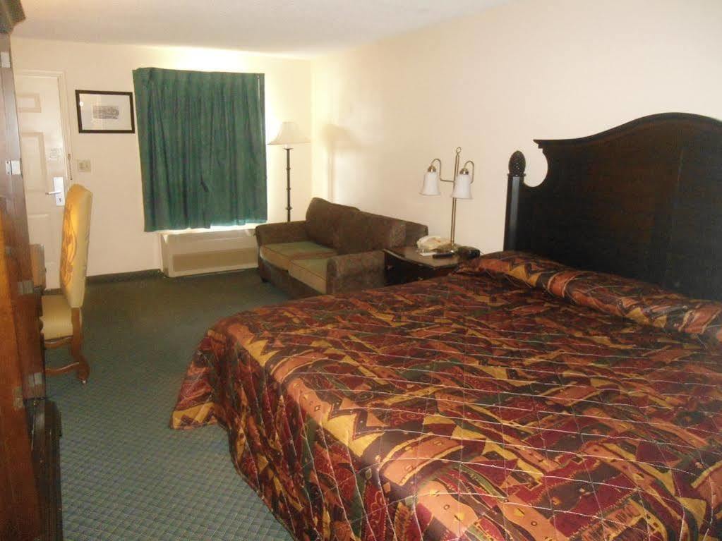 Motel Super 8 By Wyndham Foley Exterior foto